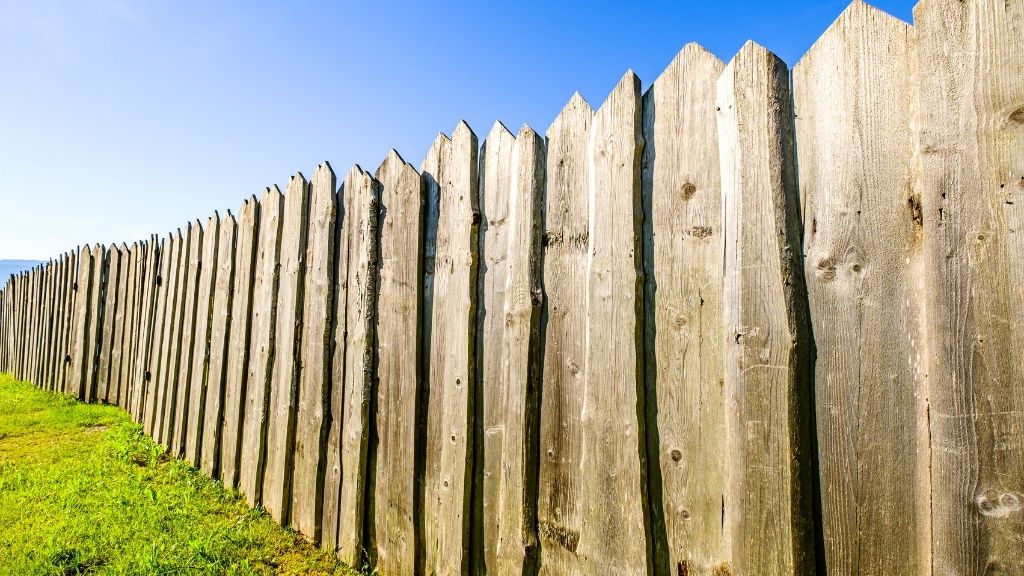 stockade style goat fence idea